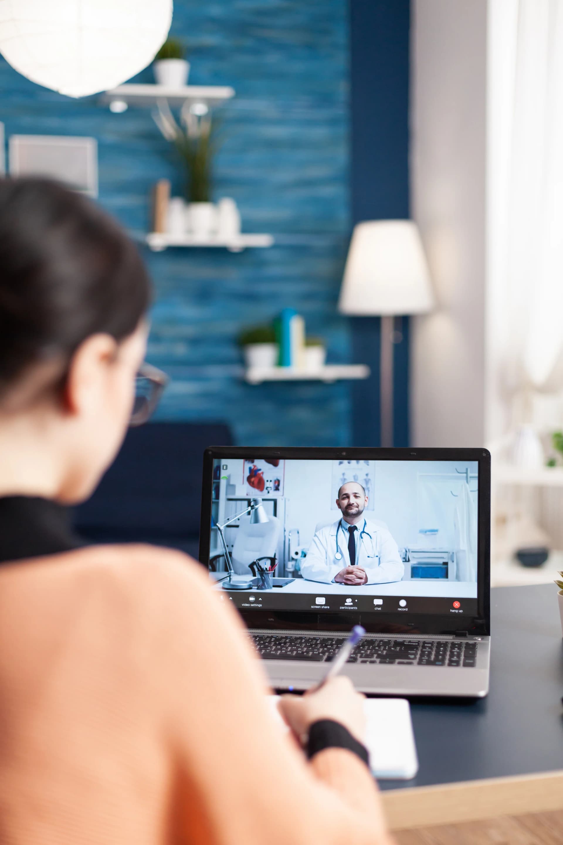 Person in a virtual appointment with a physician