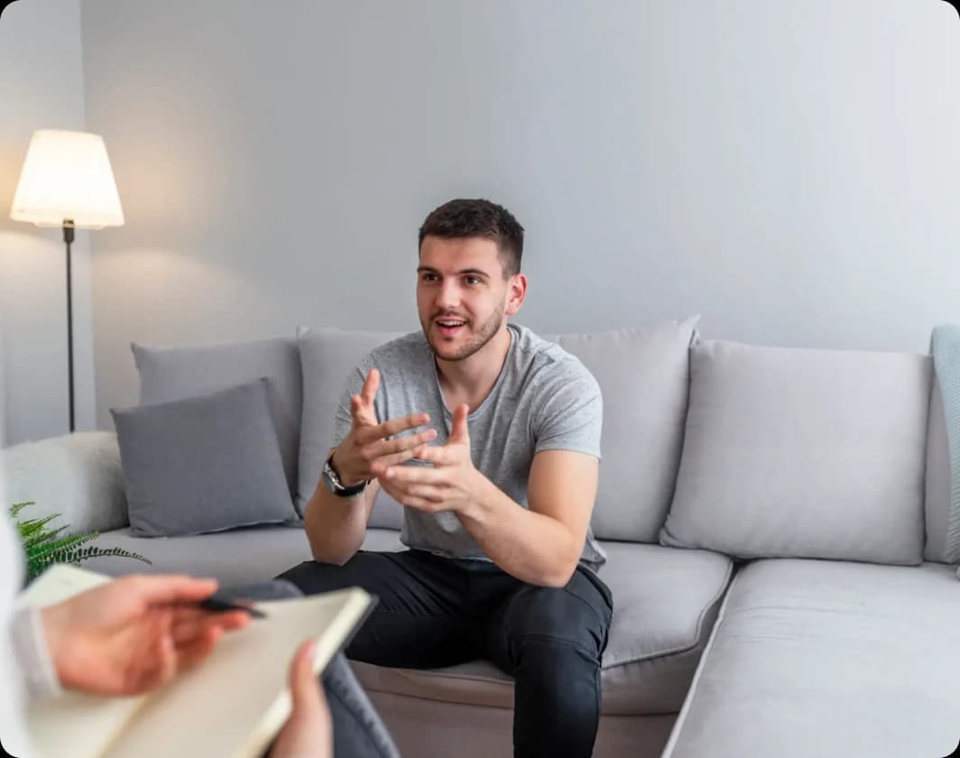 Man discussing his concerns during a consultation