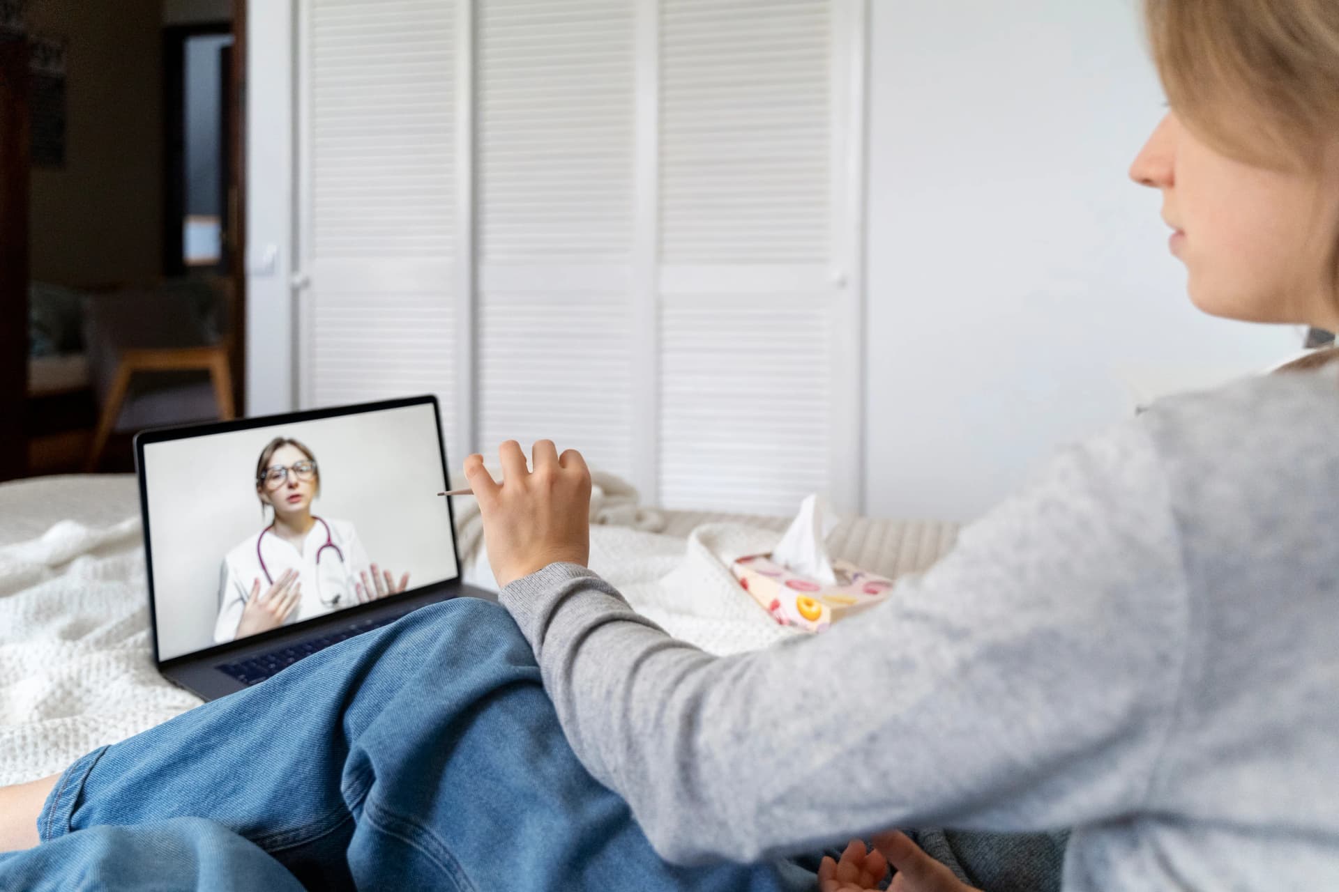 Patient on a video call with a licensed physician