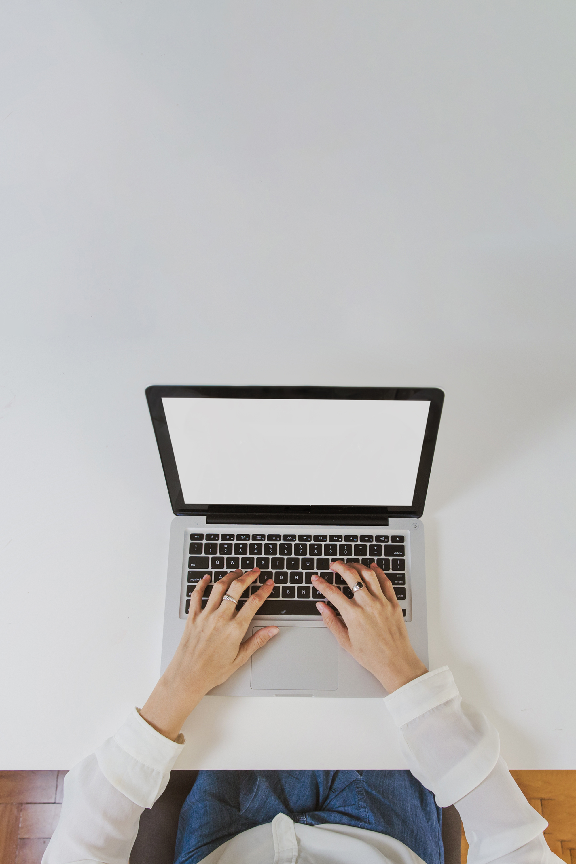 Person typing on a laptop