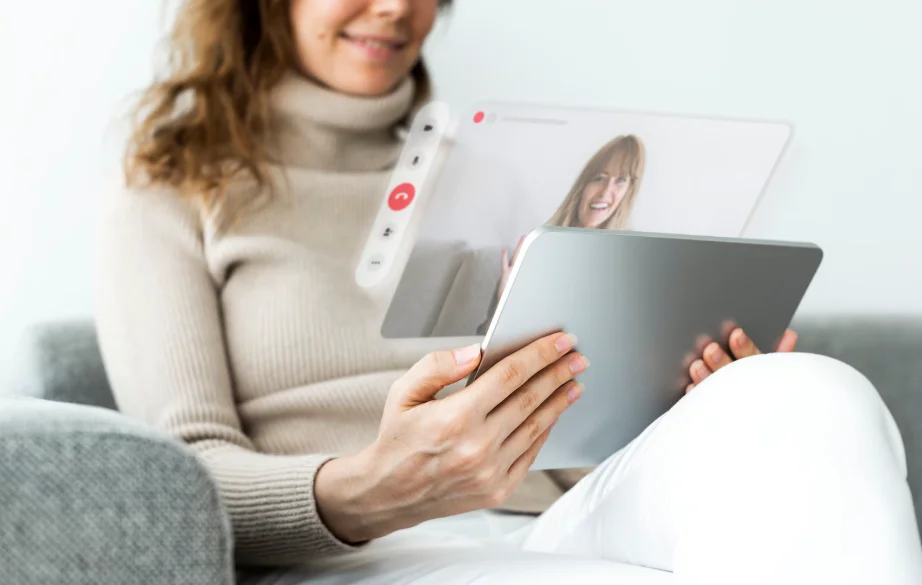 Physician on a video consultation using a tablet