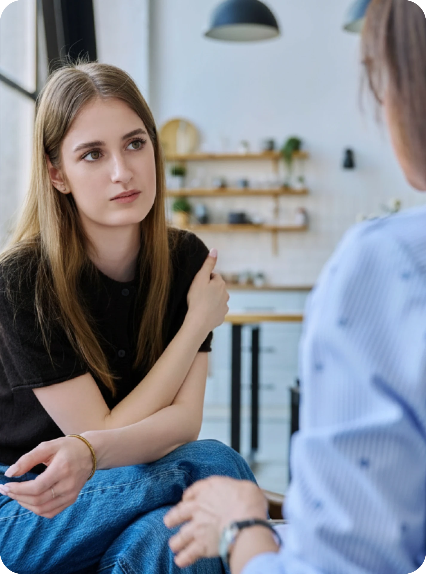 Person talking with a therapist during a virtual talk therapy session