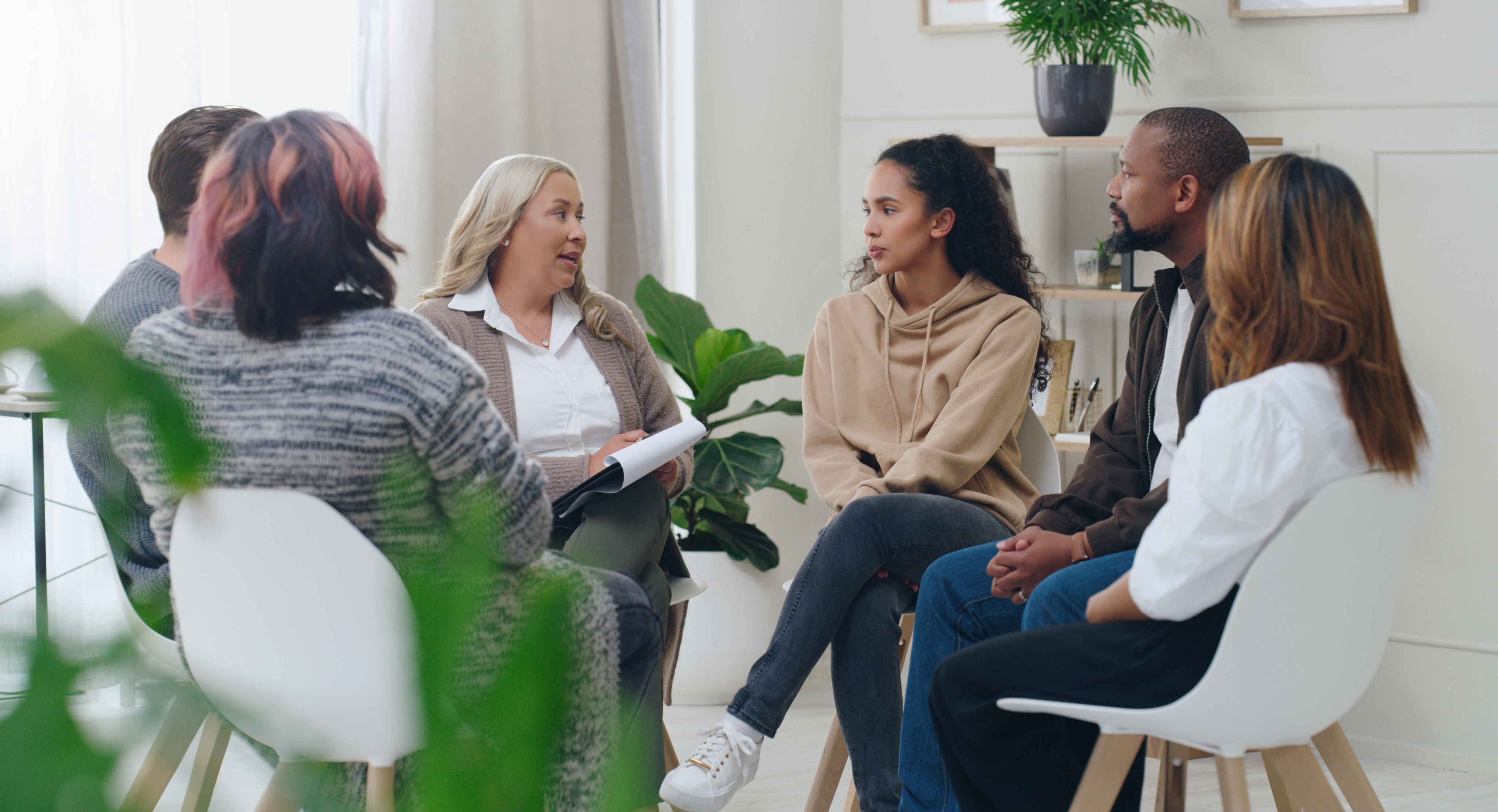 Group therapy session with a licensed therapist